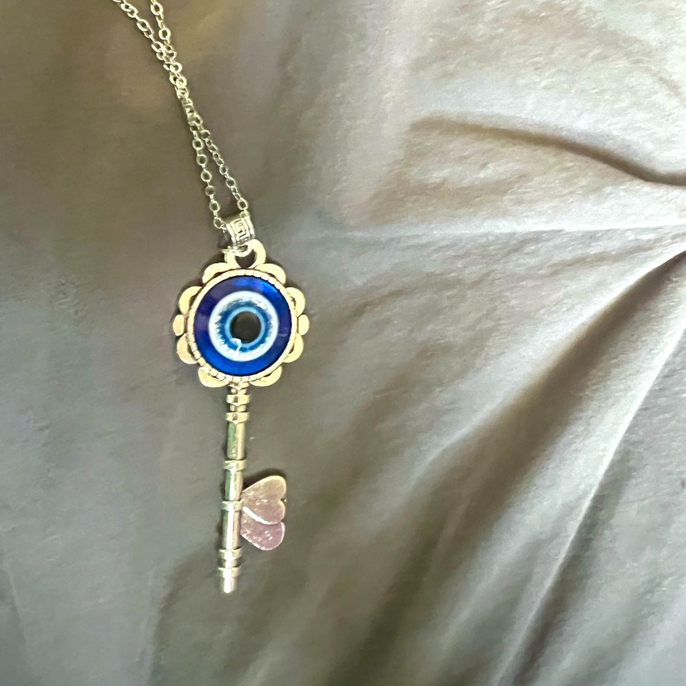 Evil eye key pendant comes with necklace
